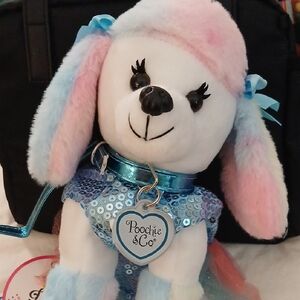 NWT  "FIFI" Poodle ,Poochie & Co. Multicolor Stuffed Poodle Purse Toy.